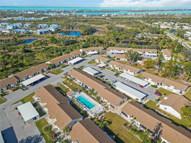 drone / aerial view with a water view