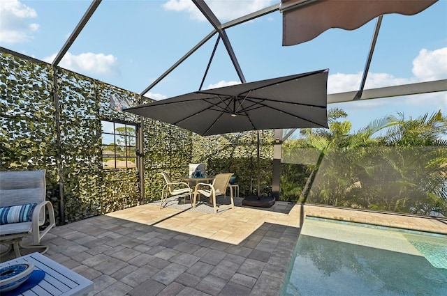 view of patio / terrace with glass enclosure