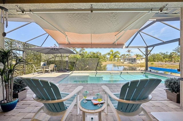 view of pool with a water view, a lanai, and a patio area