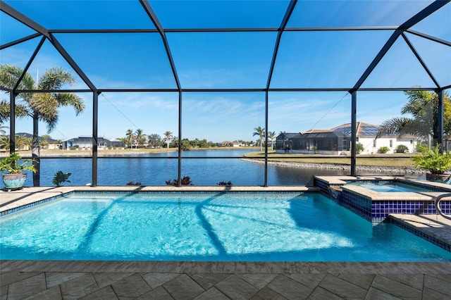 view of pool with a water view, an in ground hot tub, a lanai, and a patio