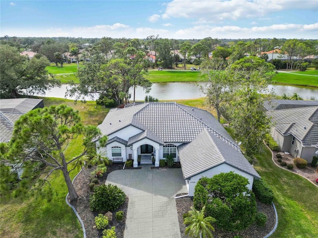 birds eye view of property featuring a water view