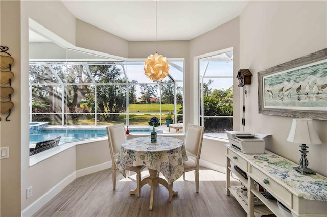 dining space with light wood-type flooring