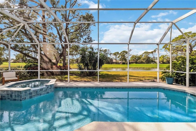 view of pool with an in ground hot tub and glass enclosure