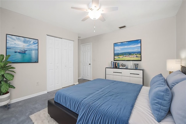 carpeted bedroom featuring a closet and ceiling fan