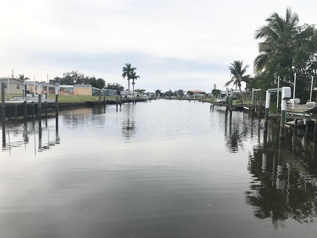 property view of water featuring a dock