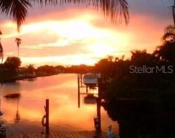 property view of water featuring a dock