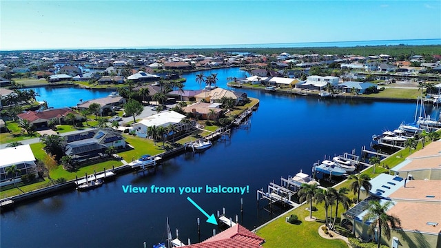 drone / aerial view featuring a water view