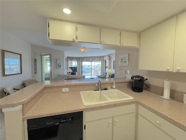 kitchen featuring kitchen peninsula, sink, and dishwasher