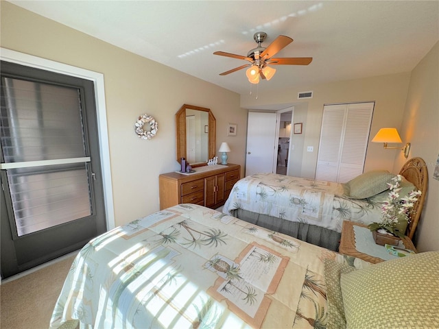 bedroom featuring ceiling fan, carpet floors, and a closet