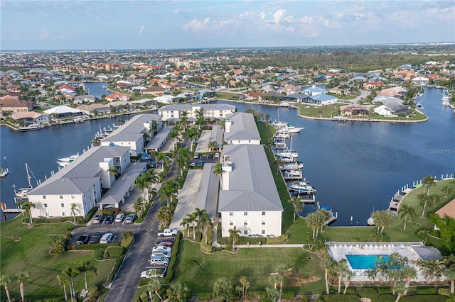 drone / aerial view with a water view