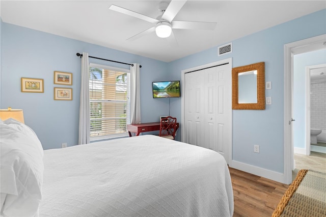 bedroom featuring a closet, ceiling fan, and light wood-type flooring