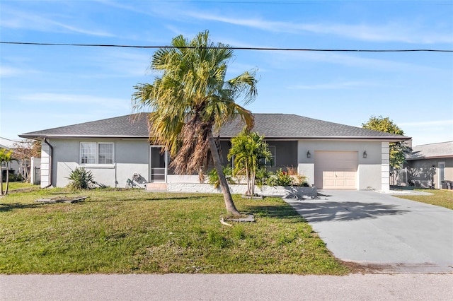 single story home featuring a garage and a front yard