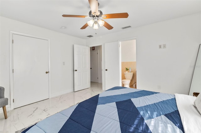 bedroom with connected bathroom and ceiling fan