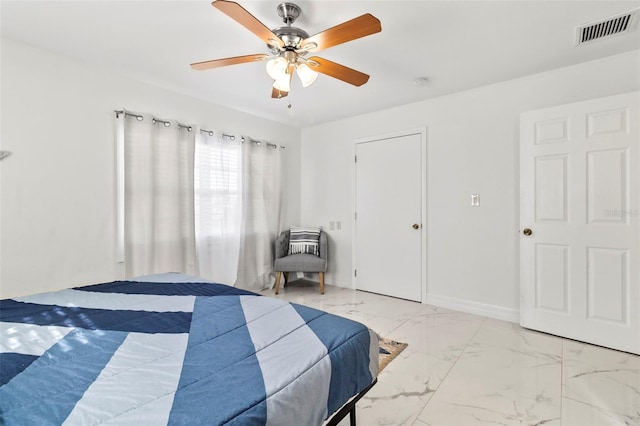 bedroom featuring ceiling fan