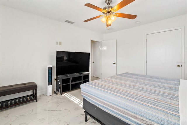 bedroom featuring ceiling fan