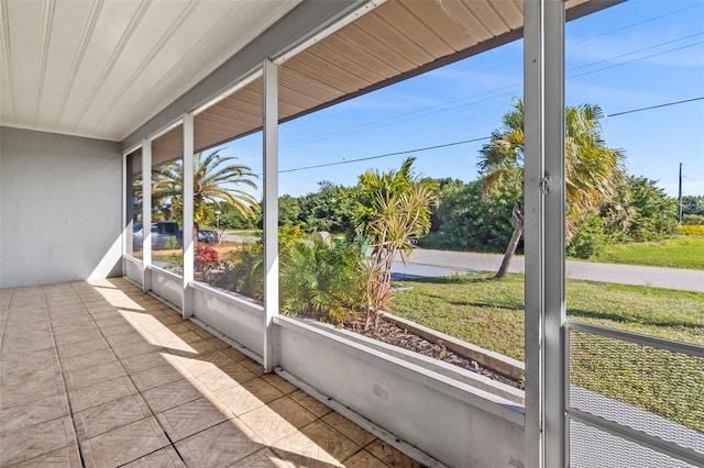 unfurnished sunroom featuring a wealth of natural light