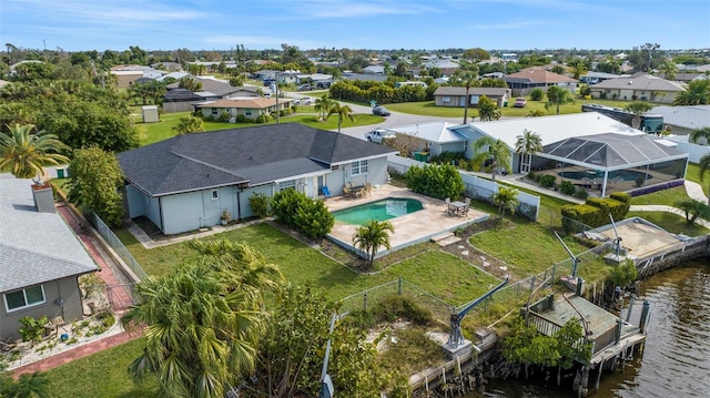 drone / aerial view featuring a water view