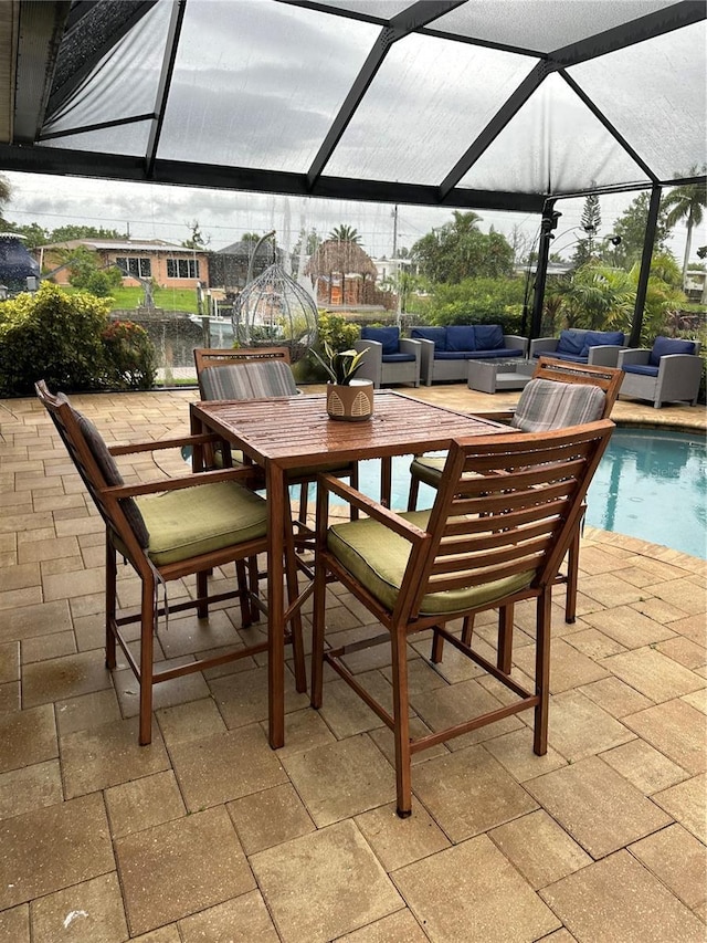 view of patio / terrace with a lanai and outdoor lounge area