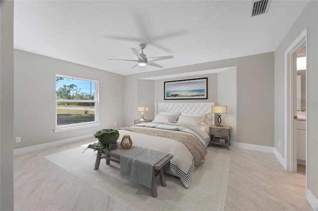 bedroom featuring light hardwood / wood-style flooring and ceiling fan