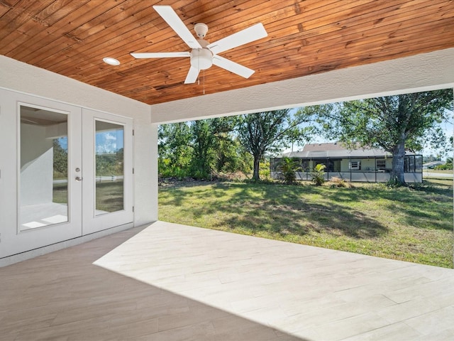 view of patio with ceiling fan and french doors