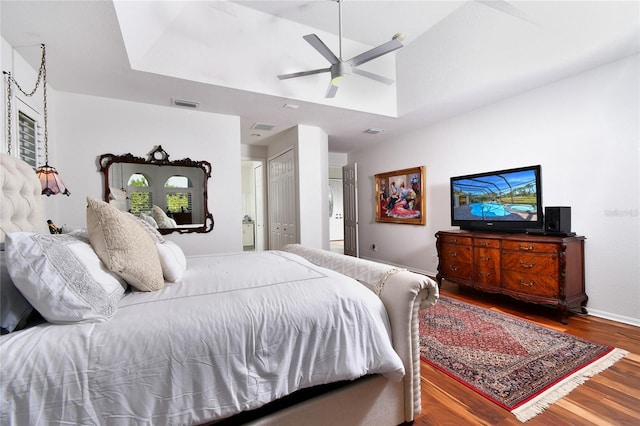 bedroom with hardwood / wood-style flooring and ceiling fan