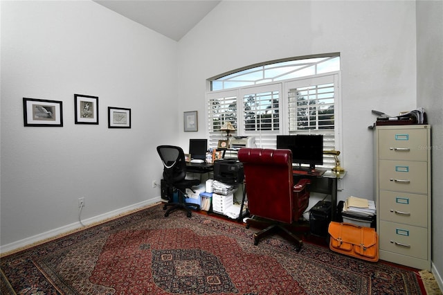 office area featuring vaulted ceiling