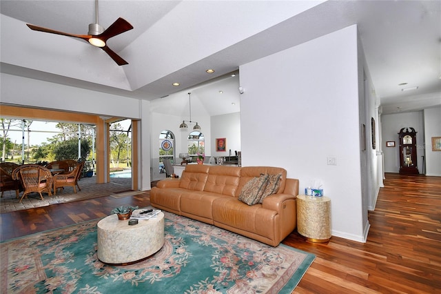 living room featuring wood-type flooring, high vaulted ceiling, and ceiling fan