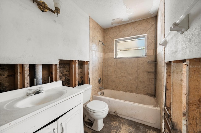 full bathroom featuring tiled shower / bath combo, vanity, and toilet