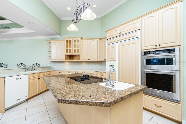 kitchen with white dishwasher, a sink, crown molding, double oven, and black electric cooktop