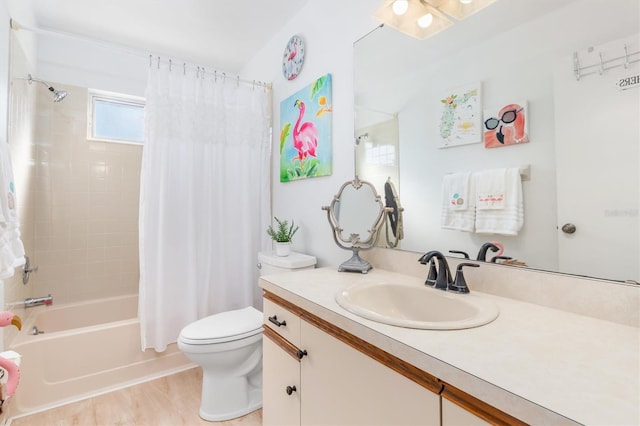 full bathroom with shower / tub combo with curtain, vanity, and toilet