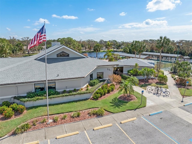 birds eye view of property featuring a water view