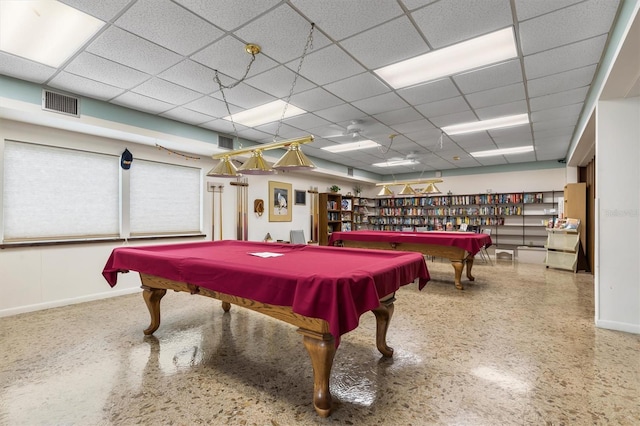 playroom with a paneled ceiling and pool table