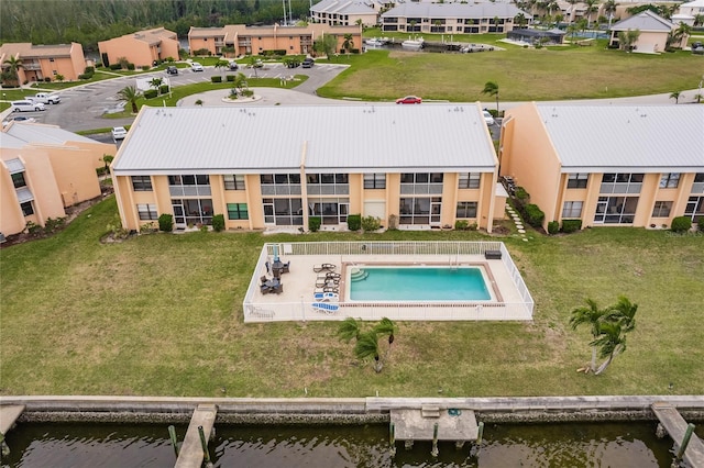 drone / aerial view with a water view