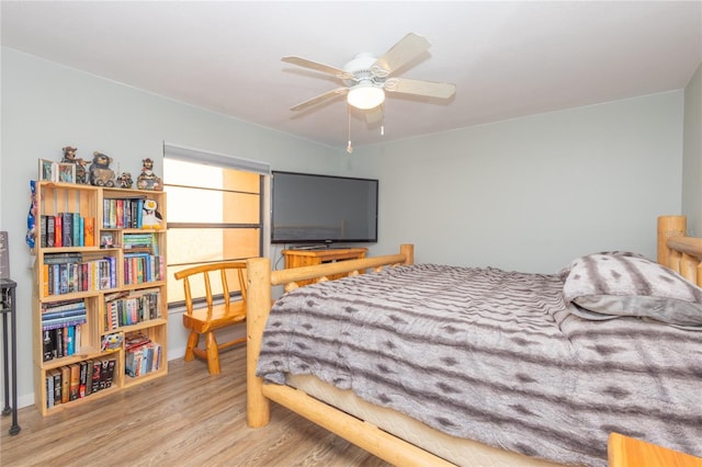 bedroom featuring ceiling fan and light hardwood / wood-style flooring