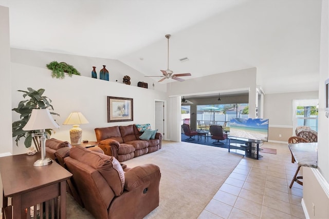 tiled living room with lofted ceiling and ceiling fan