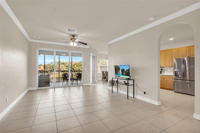 living room featuring crown molding, light tile patterned floors, and ceiling fan