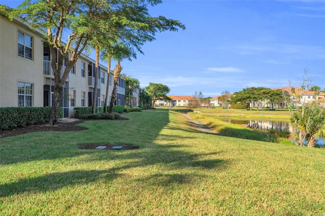 view of yard with a water view