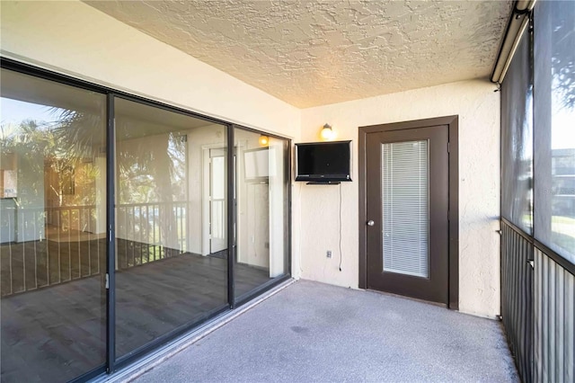 doorway to property with a balcony