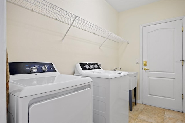 laundry area with washer and clothes dryer