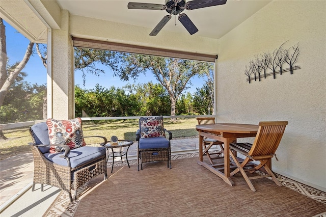 view of patio featuring ceiling fan