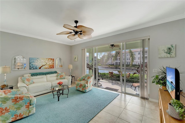 tiled living room featuring crown molding and ceiling fan