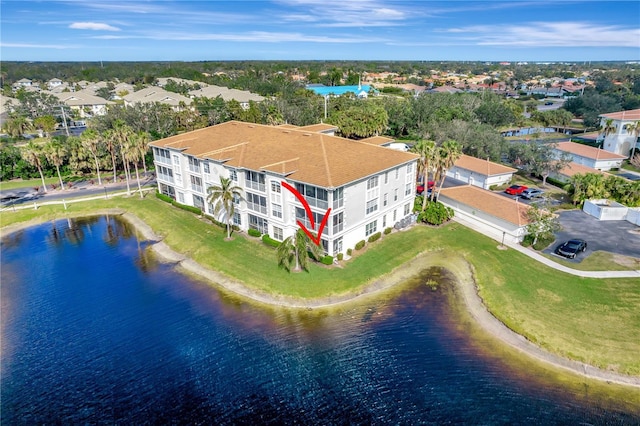 drone / aerial view featuring a water view