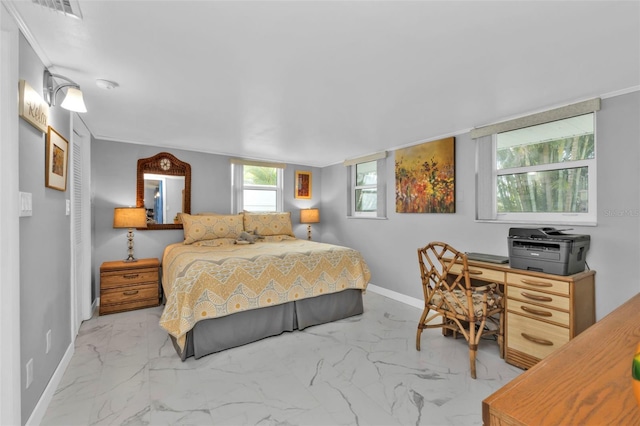 bedroom featuring crown molding