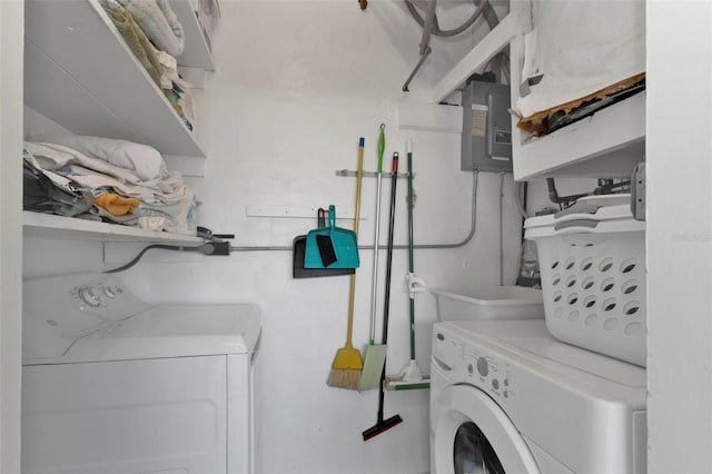 laundry area with washing machine and clothes dryer