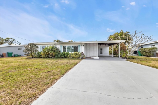 single story home featuring a front yard and a carport