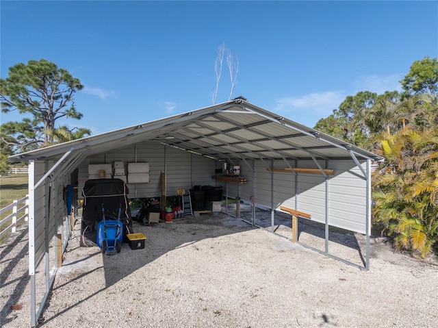 view of outbuilding featuring a carport