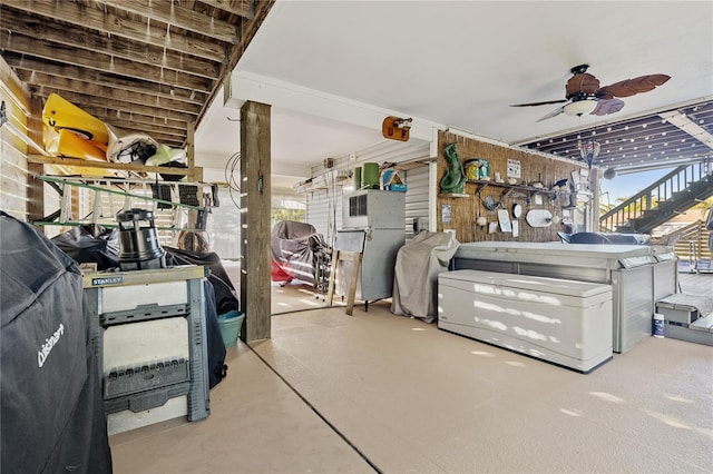 interior space featuring ceiling fan