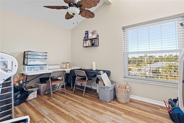 office space featuring wood-type flooring, lofted ceiling, and ceiling fan