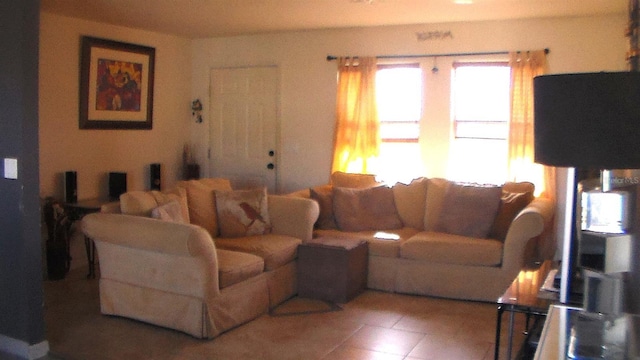 living room featuring tile patterned flooring