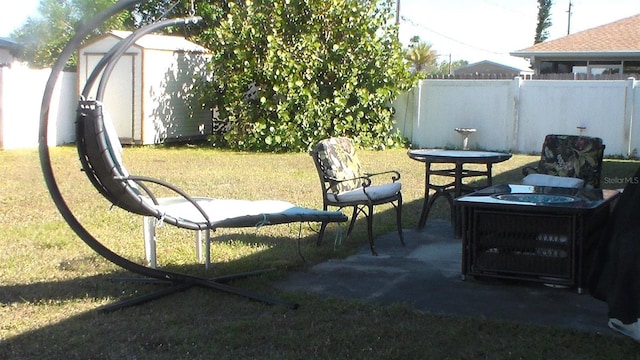 exterior space featuring a shed and a patio area